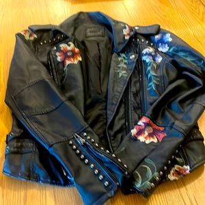 Awesome faux leather jacket with beautiful stitched flowers & metal studs.